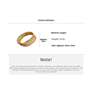 Detail view of gold-plated multi-layer spiral copper bangle weighing 27.2g with 6cm diameter