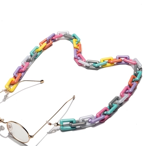 Colorful acrylic rectangle link chain for glasses and masks arranged in a heart shape