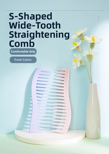 Detail view of pink and purple wide-tooth combs with ergonomic S-shaped handles