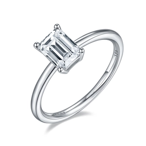 Macro shot of S925 sterling silver ring showing the inner engraving and emerald cut moissanite