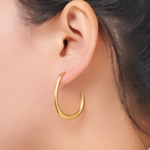 Boucles d'oreilles créoles dorées en forme de goutte avec finition miroir polie