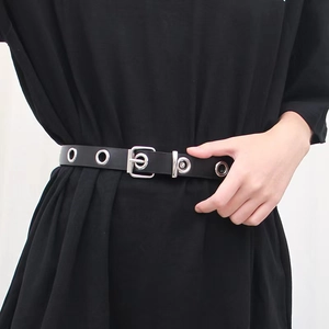 Punk style black leather grommet belt with silver metal eyelets and square buckle