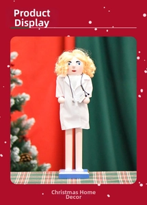 Close-up of female doctor nutcracker with gold hair, white coat and blue base for Christmas