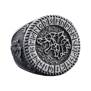 Vintage silver Viking wolf head ring with engraved runes in a high-quality centered view
