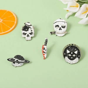 5-piece gothic punk enamel pin set featuring skulls, daggers, and cat on a green background