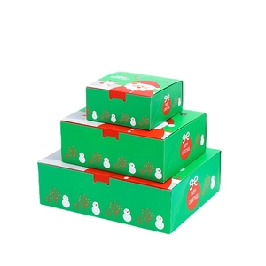 Three-piece nesting Christmas gift boxes with Santa and snowman patterns in red and green
