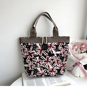 Close-up of canvas tote bag with British flag print and durable cotton rope details