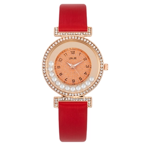 Elegant ladies quartz watch with red strap and rhinestone encrusted floating diamond dial