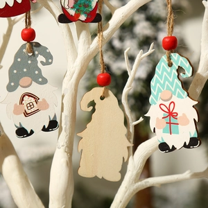 Set of four wooden Christmas gnome ornaments in blue, green, and red for tree decoration