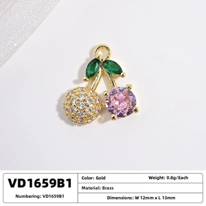Detail of cherry pendant with green crystals and micro-pave stones on brass base