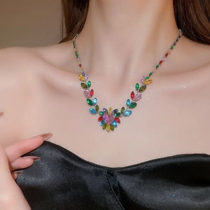 Macro shot of colorful heart and leaf shaped cubic zirconia stones on necklace