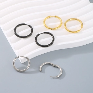 Three pairs of minimalist 18K gold-plated, silver, and black stainless steel hoop earrings