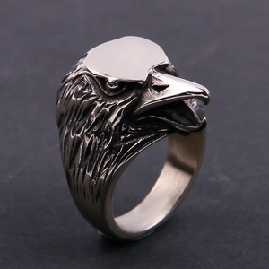 Detailed macro view of retro eagle head ring showing sharp beak and feathered texture