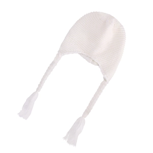 Detail view of white knit baby hat with long braided earflaps and soft tassel accents