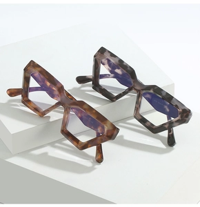 Detail of irregular tortoise shell glasses frames with blue light blocking lenses