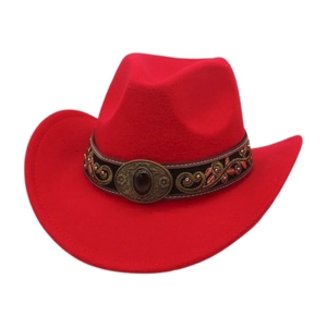 Detail of red cowboy hat featuring floral embroidery band and bronze gemstone buckle