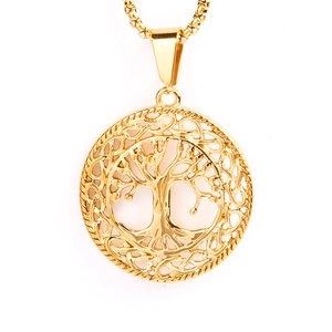 Close-up of golden hollow Tree of Life pendant with intricate woven textured outer ring