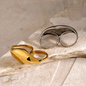 Minimalist 18k gold and silver two-finger rings with high-polished teardrop design