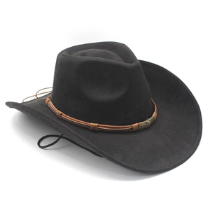 Detail of black suede cowboy hat featuring braided leather band and metal skull ornament