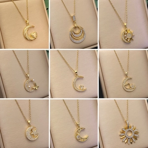 Gold-plated stainless steel star and moon pendant necklace set with cubic zirconia stones