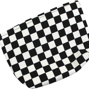 Portable black and white checkered corduroy makeup bag with a minimalist zipper closure
