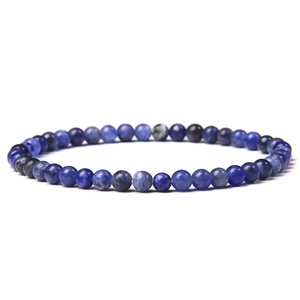Minimalist natural blue sodalite round beaded bracelet with polished stone texture