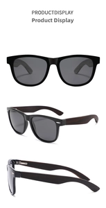 Detail view of retro oval sunglasses with natural wood temples and silver stud accents