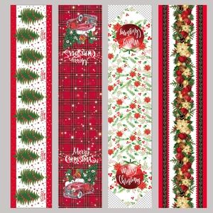 Linen Christmas table runners with various festive prints and Merry Christmas text