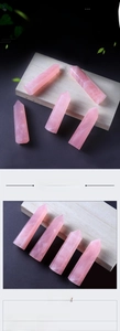 Macro detail of natural rose quartz hexagonal point showing pink crystal texture