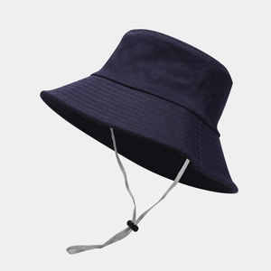 Close-up of navy blue outdoor sun hat featuring reinforced stitching and adjustable wind cord