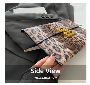 Detailed side view of leopard print envelope clutch featuring a large golden geometric lock
