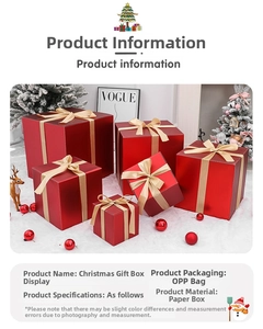 Detail of red Christmas gift boxes with champagne gold ribbons for festive shop window display