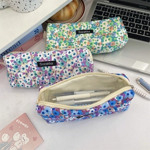 Floral canvas pencil cases in green, purple, and blue featuring large capacity storage