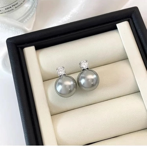 Elegant grey pearl stud earrings with sparkling zircon accents in a premium jewelry box