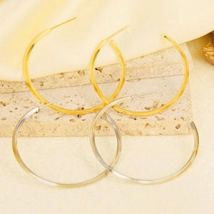 Orecchini a cerchio a spirale vintage in finitura oro e argento su seta