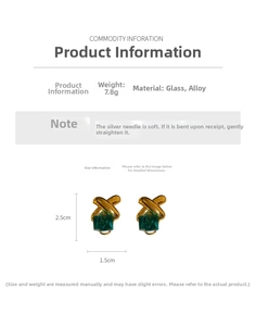 Detail view of vintage gold earrings with green square glass and S925 silver pins