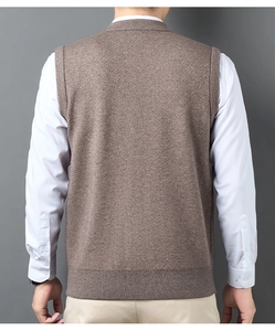 Rear view of tan knitted vest showing textured twill fabric and premium stitching details