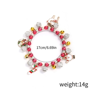Detailed view of Christmas bracelet with Santa, reindeer charms and pearls, 17cm length