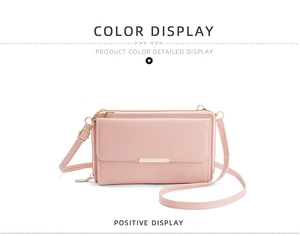 Detailed view of pink pebble leather crossbody phone bag with gold metal buckle