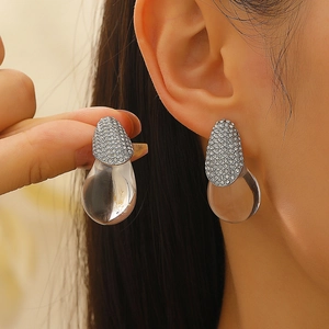 French minimalist silver earrings with pavé zircons and clear resin water drop pendants
