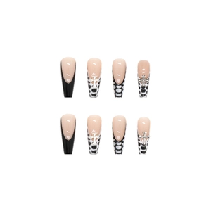 Long ballet press-on nails with black French tips, snake pattern, and silver cross charms