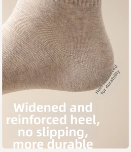 Close-up of khaki cotton sock featuring reinforced heel for anti-slip durability
