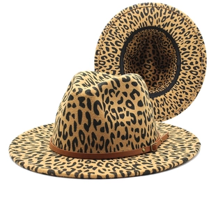 Detail of leopard print wool fedora with brown leather band and adjustable metal buckle