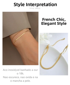 Detail of 18k gold plated stainless steel double snake chain bracelet on wrist