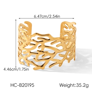 Detail view of 18K gold plated cuff bracelet showing 6.47cm diameter and coral texture