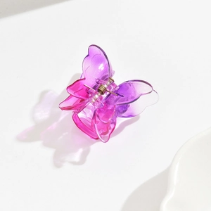 Detailed view of a 3.5cm purple gradient transparent butterfly hair clip for women