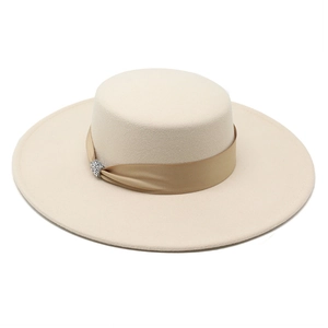 Classic beige wool felt boater hat featuring a satin ribbon and rhinestone buckle