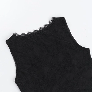 Detailed close-up showing the intricate black lace floral embroidery and delicate eyelash trim