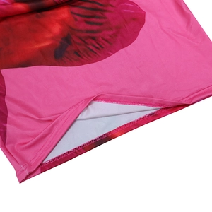 Close-up of pink floral dress hem showing neat double-stitch sewing and elastic fabric texture