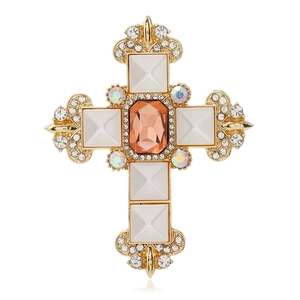 Baroque champagne gemstone cross brooch with gold plating and white pyramid resin detail